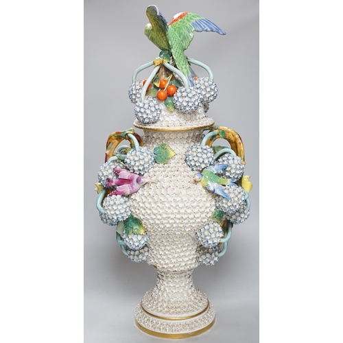 294 - A large 19th century Jacob Petit floral encrusted two handled vase and cover, decorated with birds a... 