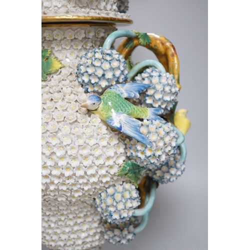 294 - A large 19th century Jacob Petit floral encrusted two handled vase and cover, decorated with birds a... 