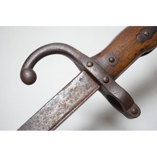 297 - A 19th century French bayonet, dated 1878, 64cms long