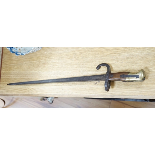 297 - A 19th century French bayonet, dated 1878, 64cms long