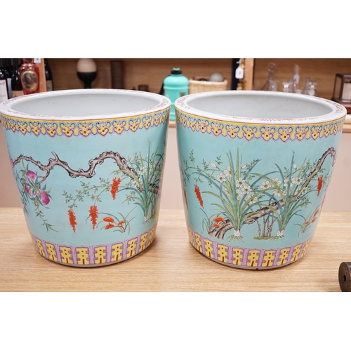 298 - A pair of large Chinese enamelled porcelain planters, 34cm