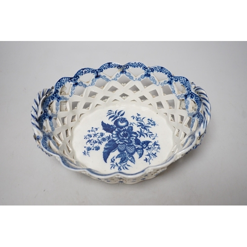 299 - An 18th century Caughley basket printed with fir cones, under a painted border, C mark and very rare... 