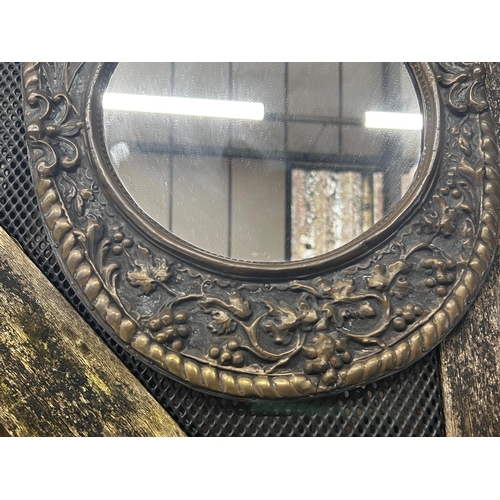 32 - Two small 19th century French embossed brass wall mirrors, larger height 51cm