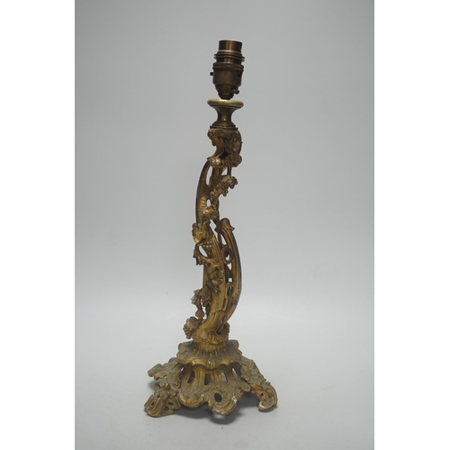 323 - A 19th century French rococo style ormolu candlestick, converted to table lamp, 39cm tall