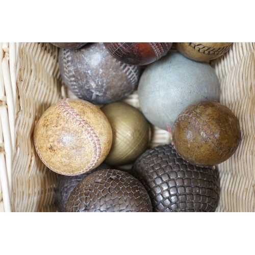 324 - A collection of leather cricket and sporting balls