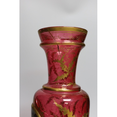 326 - A 19th century Bohemian overlaid cranberry glass vase, 37cm tall