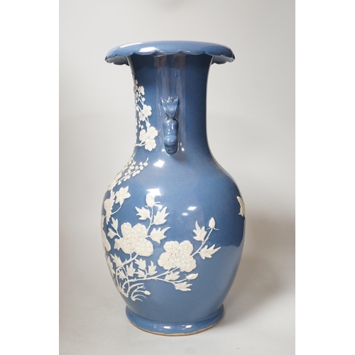 331 - A Chinese slip-decorated blue glazed vase, 40cm