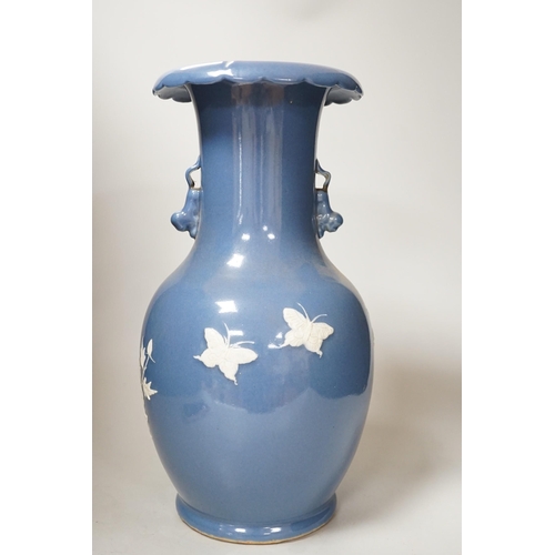 331 - A Chinese slip-decorated blue glazed vase, 40cm