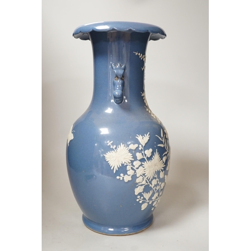 331 - A Chinese slip-decorated blue glazed vase, 40cm