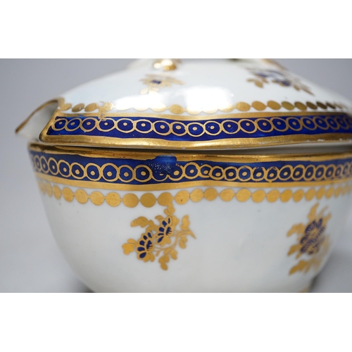 341 - An 18th century Caughley tureen cover and stand with blue and gilt decoration, stand mis-fired to bo... 