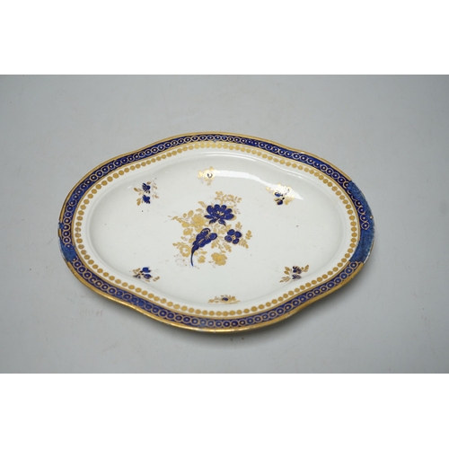 341 - An 18th century Caughley tureen cover and stand with blue and gilt decoration, stand mis-fired to bo... 