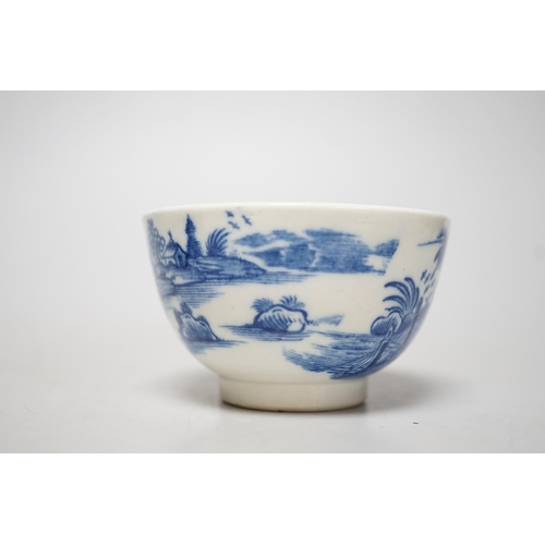 349 - An 18th century Caughley teabowl and saucer printed with the uncommon Fence and House pattern. 6cm t... 