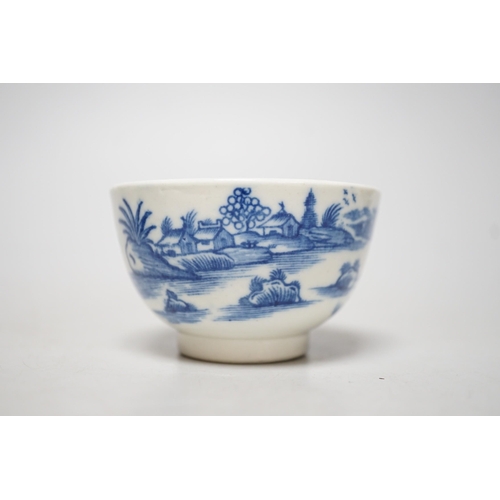 349 - An 18th century Caughley teabowl and saucer printed with the uncommon Fence and House pattern. 6cm t... 