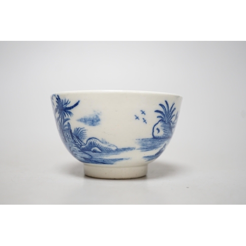 349 - An 18th century Caughley teabowl and saucer printed with the uncommon Fence and House pattern. 6cm t... 