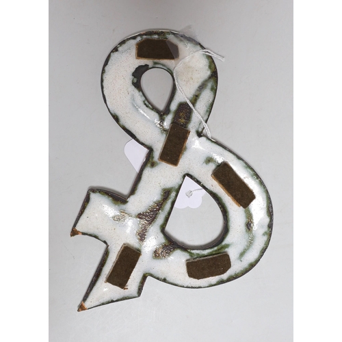 355 - A white enamelled & sign,15.5cms high