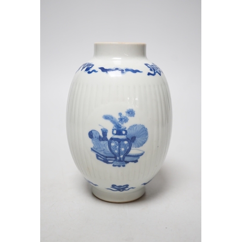 358 - A Chinese blue and white fluted ovoid jar 16cm