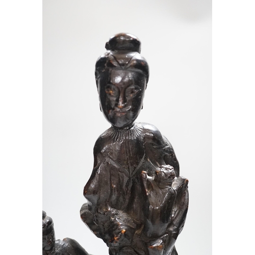 369 - A Chinese root wood carving of two women, 42cm