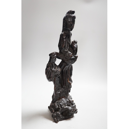 369 - A Chinese root wood carving of two women, 42cm