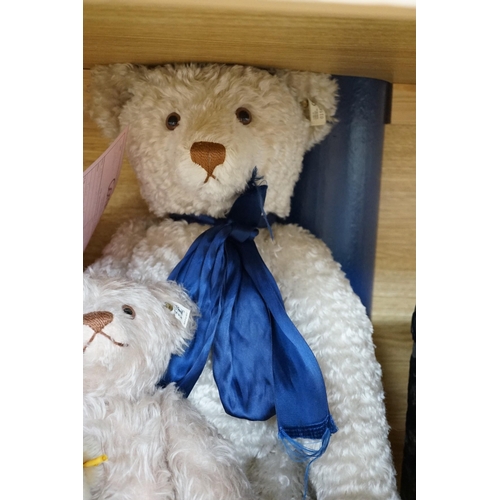 374 - A large Steiff growler blonde plush teddy bear, 68cms long and four other Steiff teddy bears,