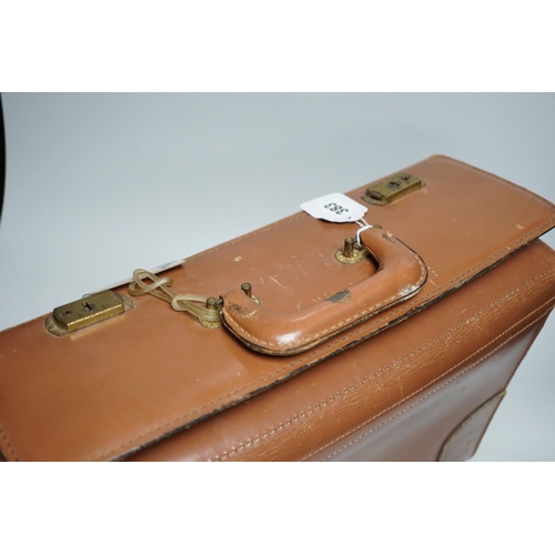 383 - A leather case, proprorted to have once belonged to Roger Daltrey of The Who, with Tidal Wave Produc... 