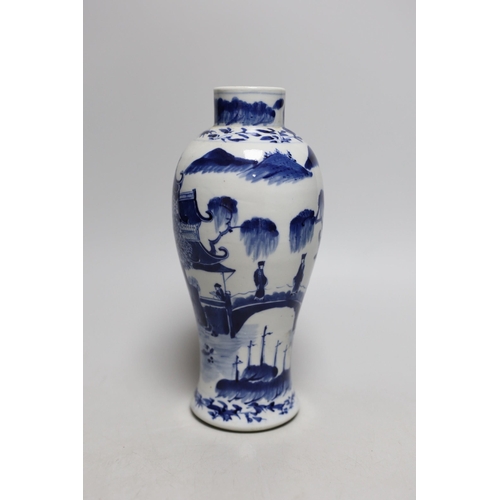 386 - A 19th century Chinese blue and white baluster vase, 23cms high