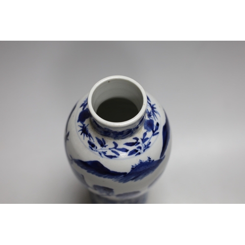 386 - A 19th century Chinese blue and white baluster vase, 23cms high