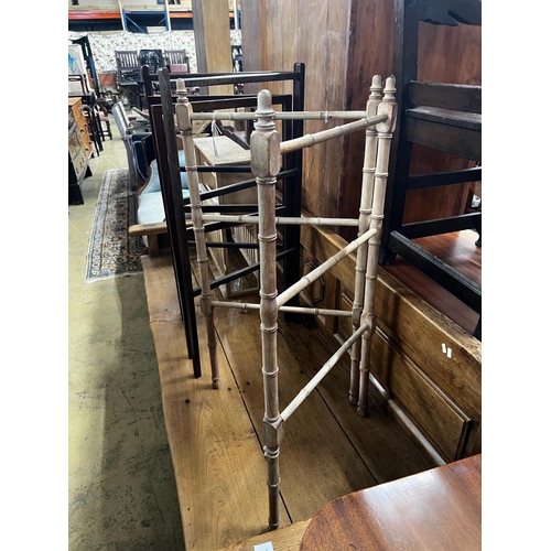 39 - A 19th century faux bamboo folding towel rail together with two mahogany towel rails, largest height... 