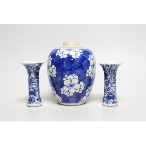 390 - A Chinese blue and white prunus jar, two miniature vases and a dish, all Kangxi period, jar 14cms hi... 