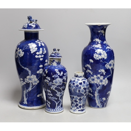 406 - A Chinese prunus baluster jar and cover and three others, similar,tallest 30cms high