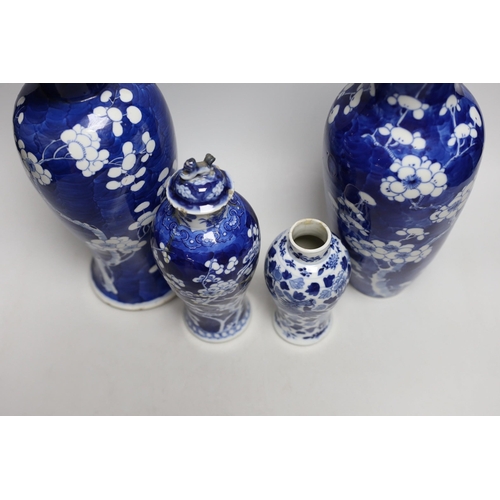 406 - A Chinese prunus baluster jar and cover and three others, similar,tallest 30cms high