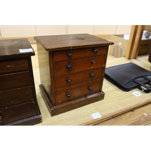 423 - Three miniature four drawer collector's chests, tallest 33cms high