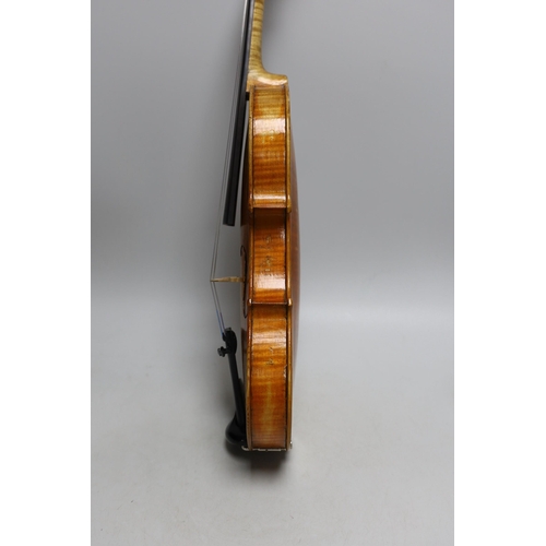 425 - A cased violin, sound post loose