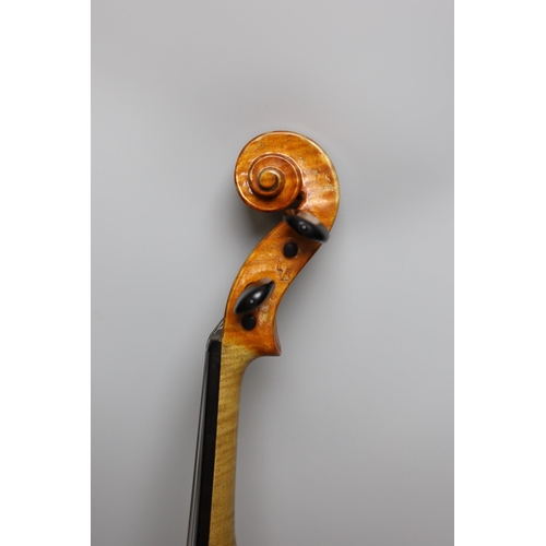 425 - A cased violin, sound post loose