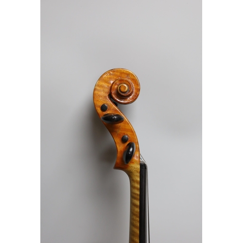 425 - A cased violin, sound post loose