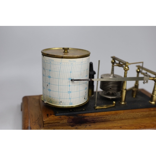 447 - A Negretti & Zambra oak cased barograph, 34cm wide