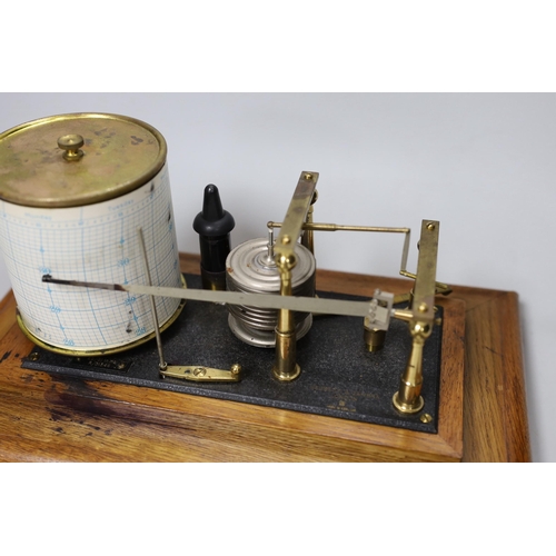 447 - A Negretti & Zambra oak cased barograph, 34cm wide