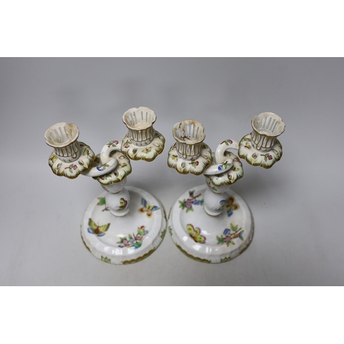 458 - A pair of Herend porcelain two branch candelabra, 22cm