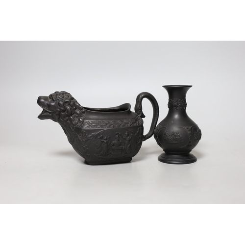 459 - An early 19th century Wellington commemorative black basalt cream jug and a Wedgwood basalt vase... 