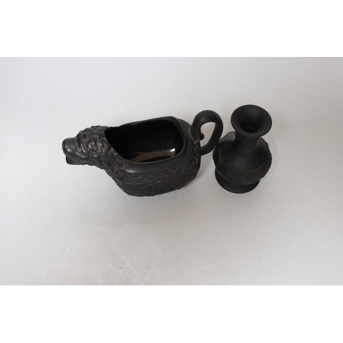 459 - An early 19th century Wellington commemorative black basalt cream jug and a Wedgwood basalt vase... 