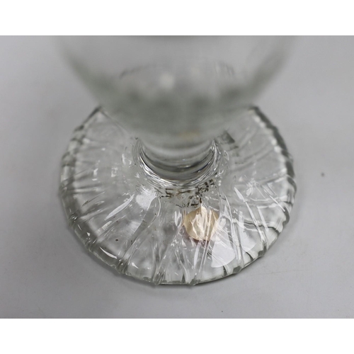 473 - A Georgian moulded toasting glass. 9cm tall