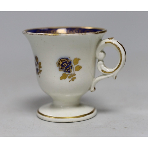 474 - A Caughley rare ice or sorbet cup decorated in blue and gilt, S mark. 6cm tall