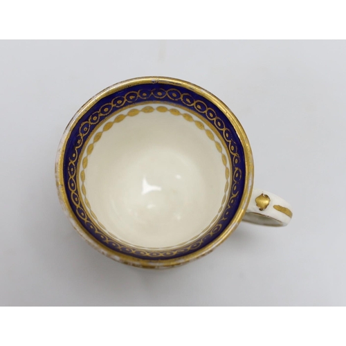 474 - A Caughley rare ice or sorbet cup decorated in blue and gilt, S mark. 6cm tall