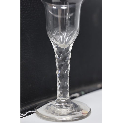 478 - A George III facet stem wine glass, 15cms high