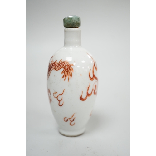 484 - A Chinese rouge-de-fer 'dragon' snuff bottle, late 19th century, 6.7cm Provenance - the former owner... 