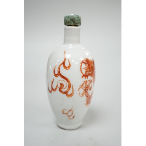 484 - A Chinese rouge-de-fer 'dragon' snuff bottle, late 19th century, 6.7cm Provenance - the former owner... 