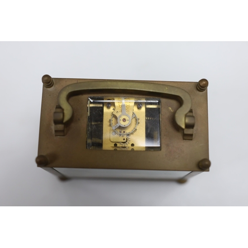 490 - A lacquered brass carriage clock, 12cm wide, cased