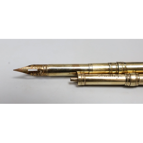 498 - A George V 9ct gold dip pen by Sampson Mordan & Co, 12.4cm, 6.8 grams and a Sampson Mordan & Co yell... 