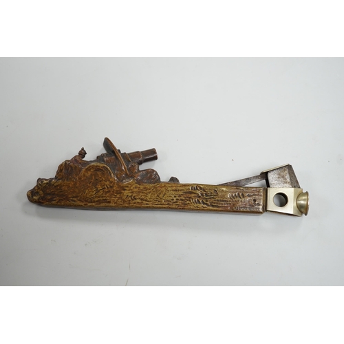 504 - An early 20th century Austrian bronze cigar cutter cast with an artillery cannon 19.5cm long