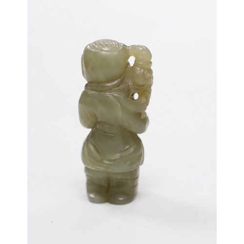 514 - A Chinese celadon jade figure of a boy. 4.5cm tall