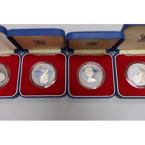 517 - Eight Royal Mint QEII Commonwealth proof silver commemorative coins